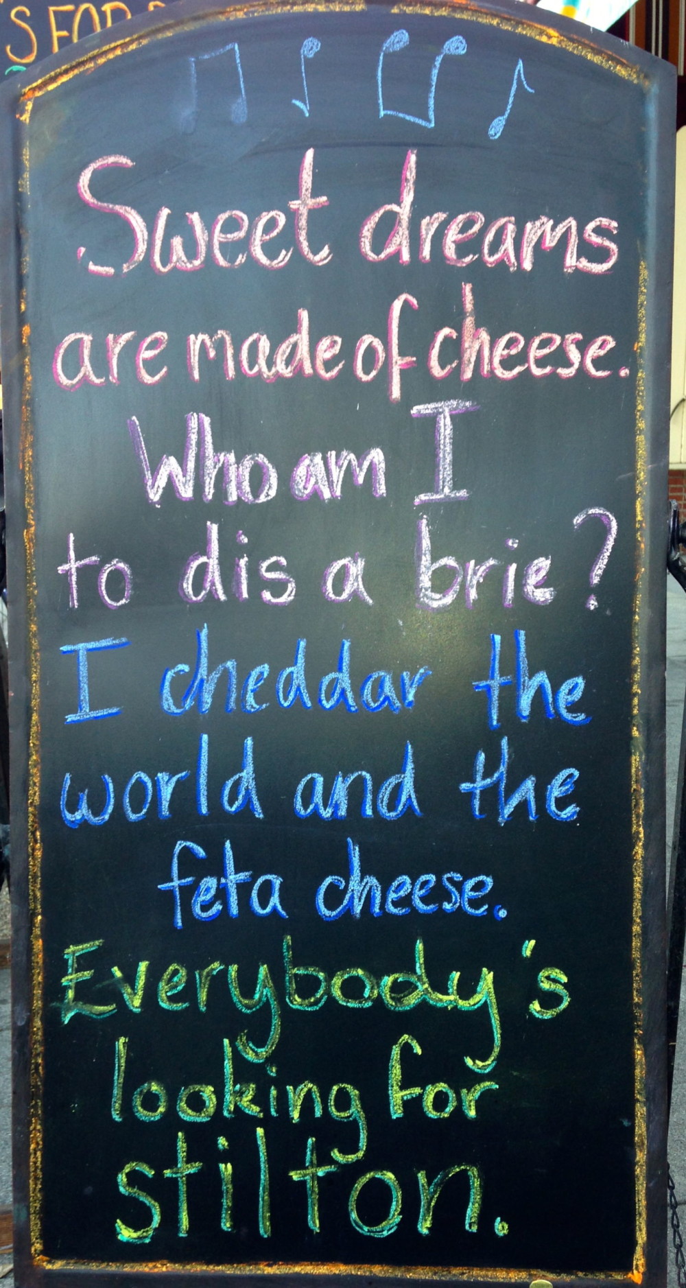 Say CHEESE!  This is the sign in front of the loveliest cheese shop.
